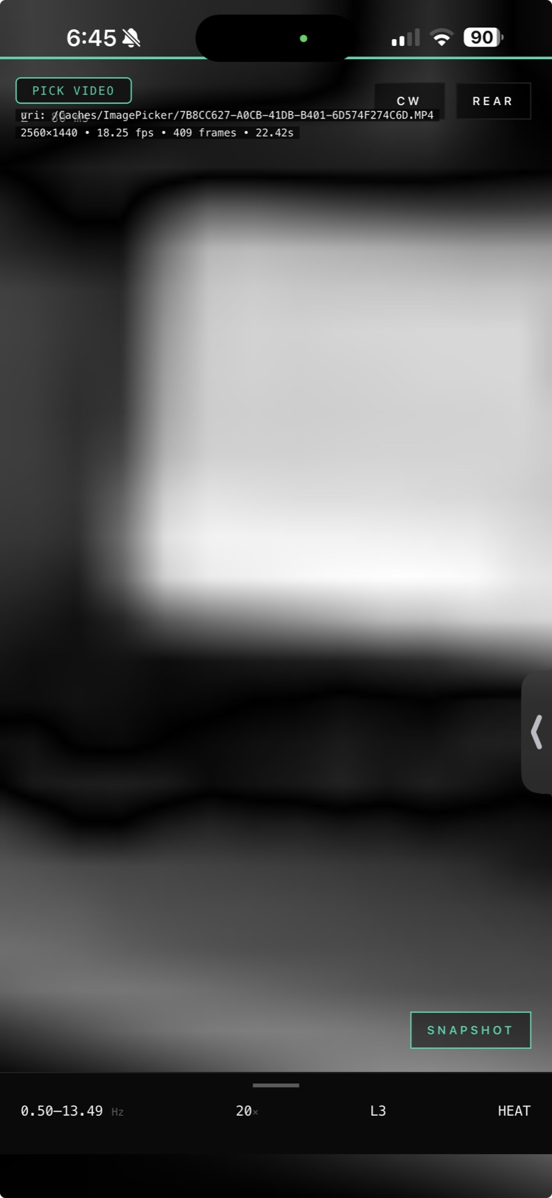 Motion Amplifier iOS app — heatmap mode, 0.50–13.49 Hz band, 20× amplification, with a video clip loaded
